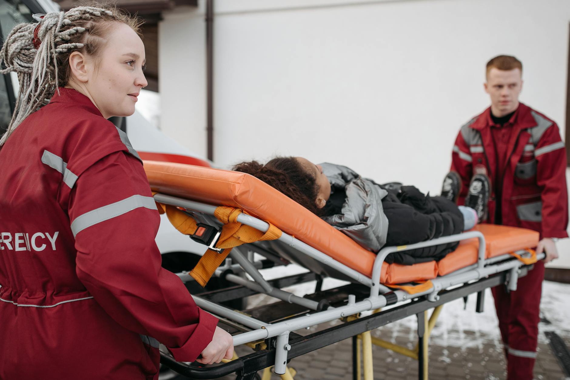 emt pushing a stretcher